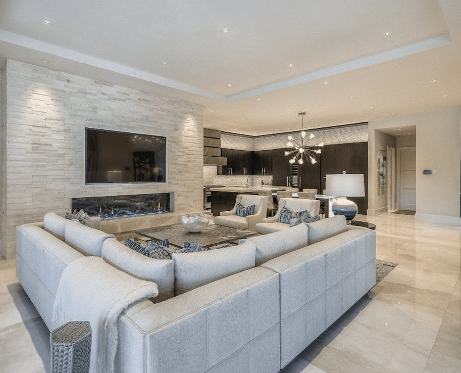 neutral colored stone on fireplace in contemporary living room