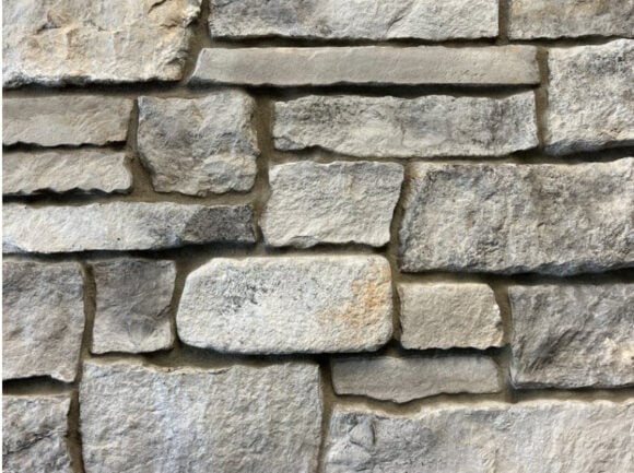 light colored chiseled faux stone